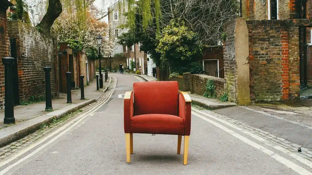 The armchair in the middle of the road symbolizes the importance of self-reflection which is a key point in psychotherapy.