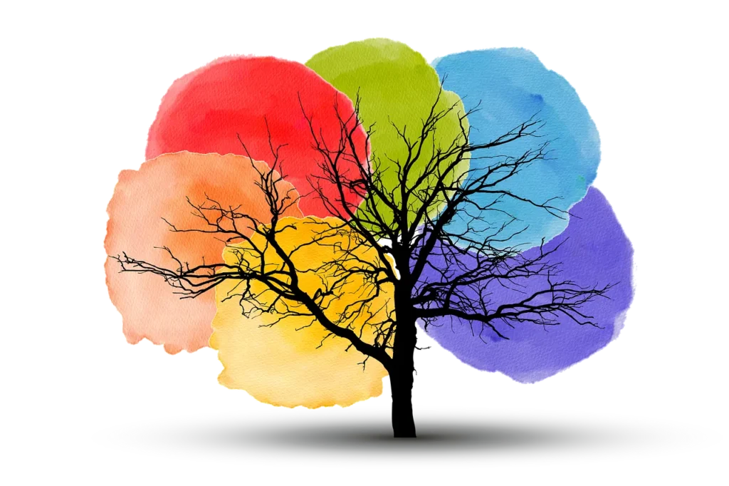 Stablo s raznobojnom krošnjom predstavlja složenost i raznolikost unutarnjeg rasta i procesa promjene tijekom psihoterapije.